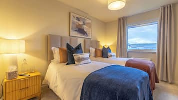 2 dormitorios, tabla de planchar con plancha, wifi gratis y ropa de cama