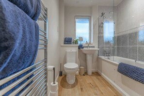 Shower, hair dryer, shampoo