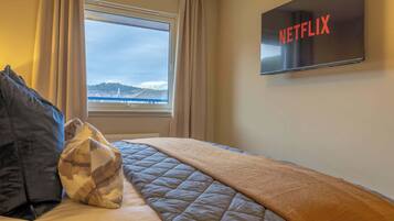 2 dormitorios, tabla de planchar con plancha, wifi gratis y ropa de cama