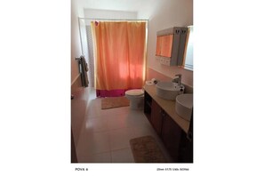 Shower, towels, soap, toilet paper