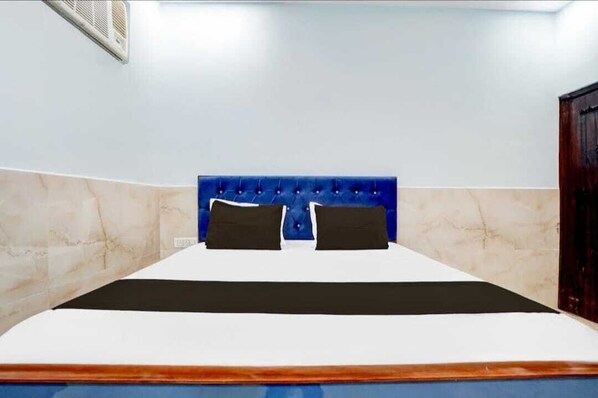 Habitación Deluxe | Camas supletorias, wifi gratis, ropa de cama