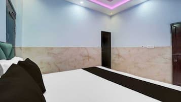 Habitación Deluxe | Camas supletorias, wifi gratis, ropa de cama