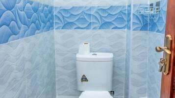 Classic Apartment | Bathroom | Shower, free toiletries, slippers, towels