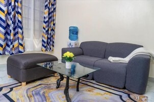 Classic Apartment | Living area | 32-inch Smart TV with digital channels