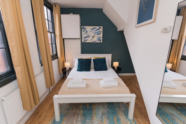 3 habitaciones, tabla de planchar con plancha y acceso a internet