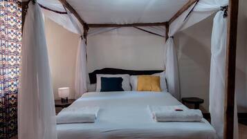 Deluxe Cottage, Balcony, Garden View | Free WiFi, bed sheets