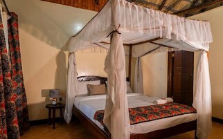 Deluxe Cottage, Balcony, Garden View | Free WiFi, bed sheets