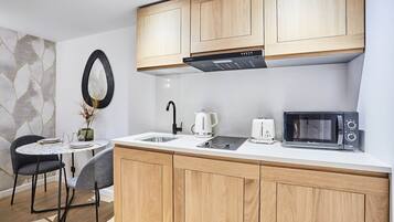 Apartment | Private kitchen | Fridge, microwave, stovetop, coffee/tea maker
