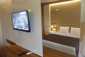 Condo superior | Camas extras/dobráveis, Wi-Fi de cortesia, roupa de cama