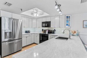 Fridge, microwave, coffee/tea maker, toaster