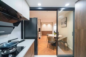 Appartement Élite | Coin cuisine privé | Serviettes en papier