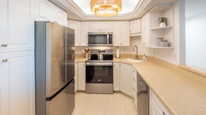 Fridge, oven, stovetop, coffee/tea maker