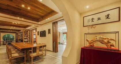 Anji Double Fish Hall Hot Spring Resort B&B (Longwangshan Canyon Drift Shop)