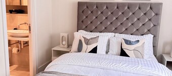 Stylish 4BR Home, Serene and Central.