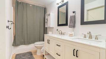 Hair dryer, towels, soap, toilet paper