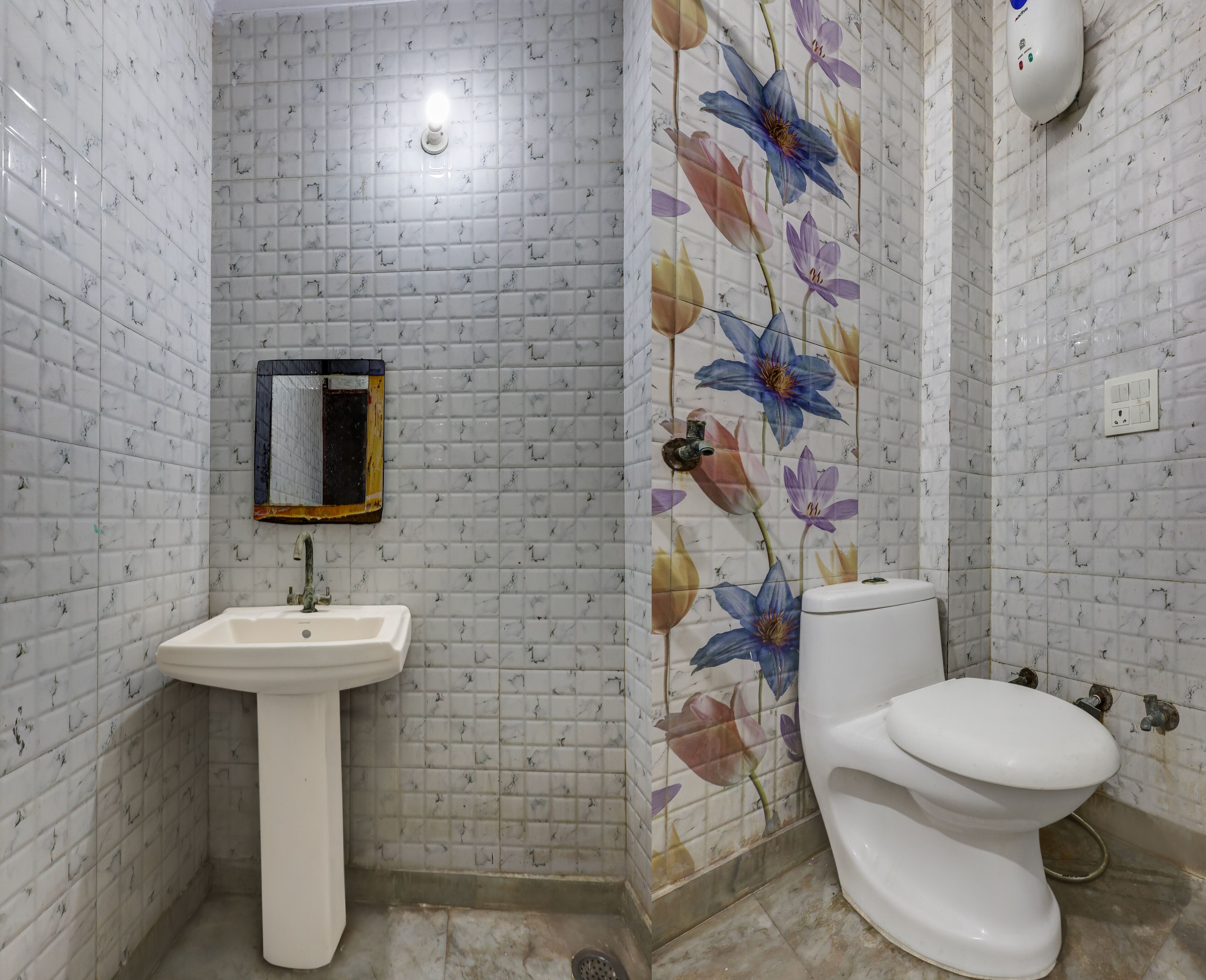 A bathroom with a white sink, a toilet, and a mirror on the wall.