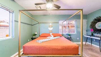 1 bedroom, desk, iron/ironing board, travel crib