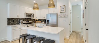 2 Mi to UT: Modern Retreat w/ Covered Porch