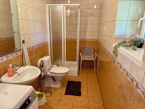 Shower, hair dryer, towels, soap