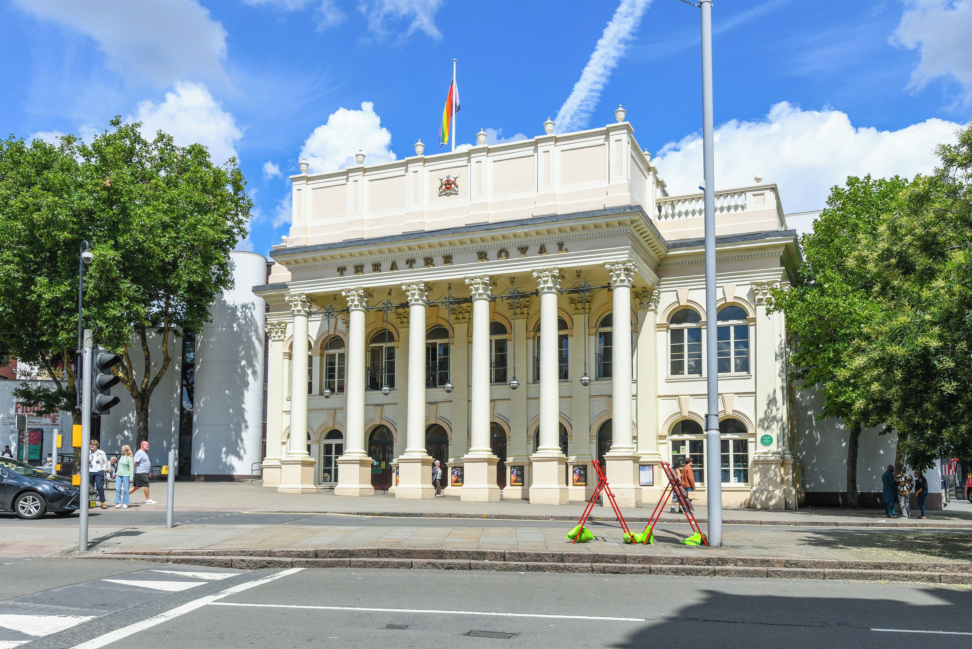 A classical building with large columns and arched windows, likely a public or historical building.