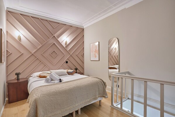 Departamento | 1 habitación, tabla de planchar con plancha y ropa de cama