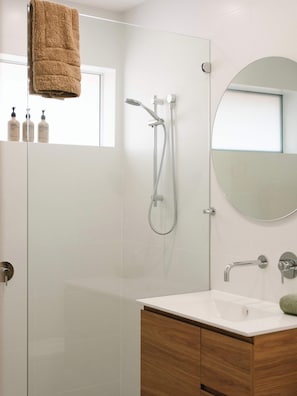 Shower, hair dryer, towels