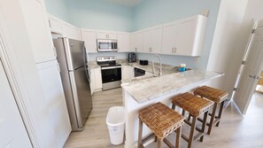 Condo, 3 Bedrooms | Private kitchen | Fridge, oven, coffee/tea maker, toaster