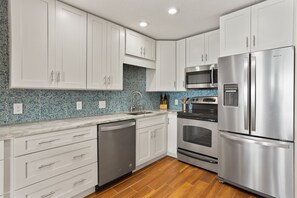 Condo, 3 Bedrooms | Private kitchen | Fridge, coffee/tea maker, toaster