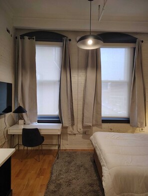 1 chambre, fer et planche à repasser, Wi-Fi gratuit, draps fournis