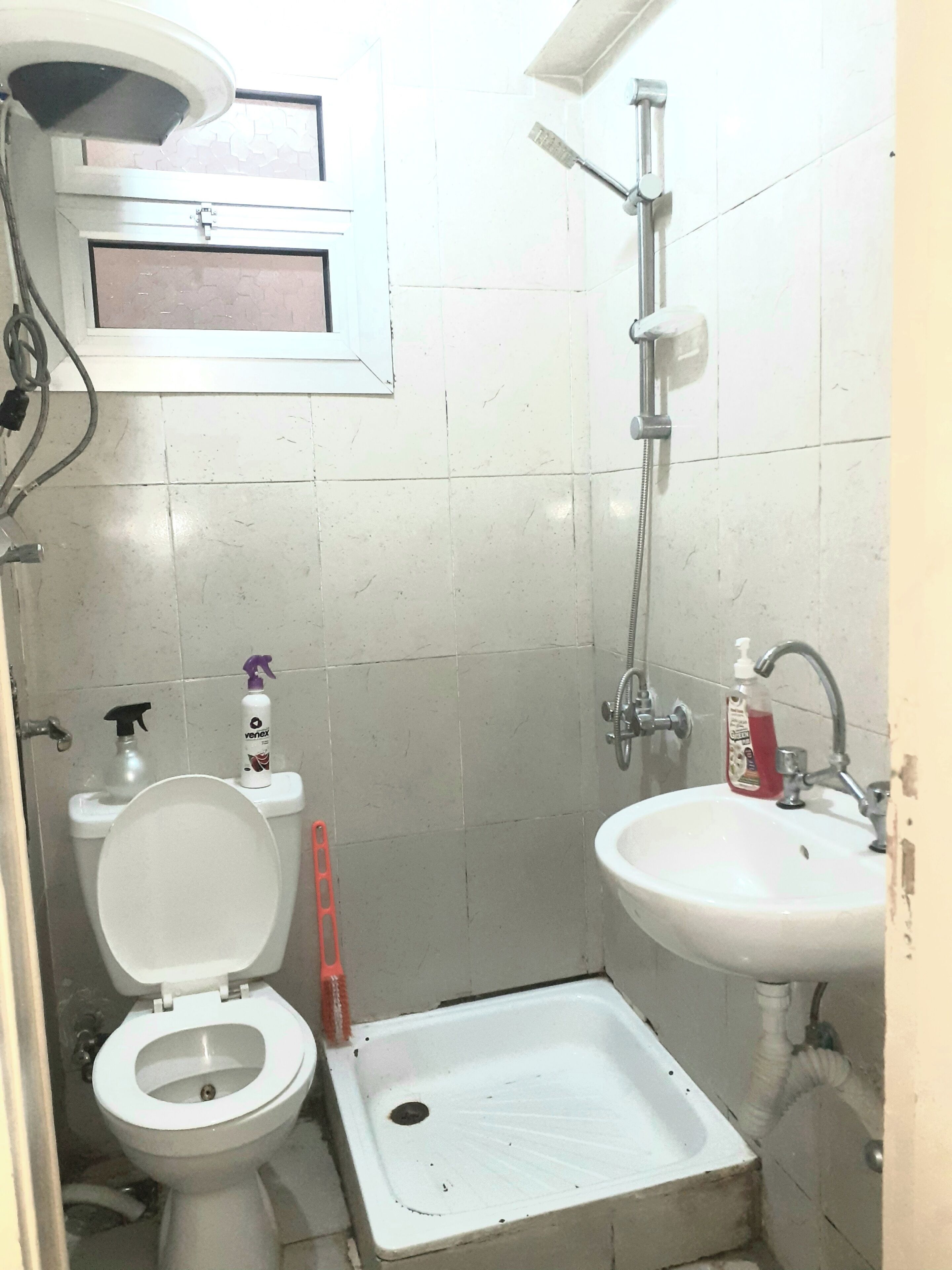 Shower, towels, soap, toilet paper