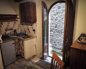 Apartment | Private kitchen | Fridge, stovetop, espresso maker, highchair