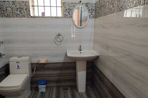 Shower, towels, soap, toilet paper