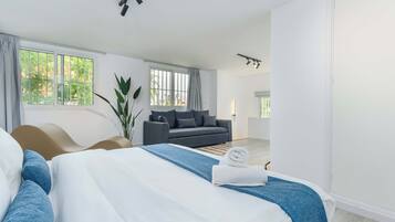 Duplex, 1 Bedroom, Kitchen, Garden View | Desk, laptop workspace, blackout drapes, iron/ironing board