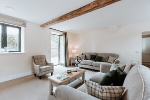 Martingale - Luxury House with Private Courtyard | Living area | Flat-screen TV