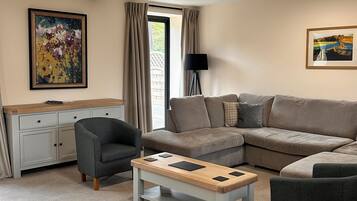 Stirrup - Luxury Barn Conversion, Pet Friendly | Living area | Flat-screen TV