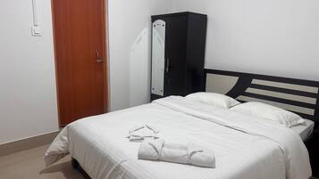 Standard Quadruple Room, City View | Free WiFi, bed sheets