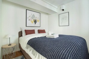 1 bedroom, laptop workspace, iron/ironing board, bed sheets