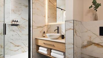 Apartment, 2 Bedrooms | Bathroom | Shower, free toiletries, hair dryer, towels