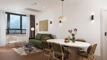 Apartment, 2 Bedrooms | Living area | 35-inch flat-screen TV with digital channels