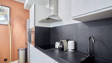 Apartamento | Cozinha privada | Produtos de limpeza