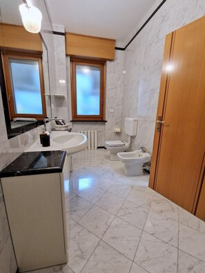 Quadruple Room, Garden View | Bathroom | Shower, hair dryer, towels, soap
