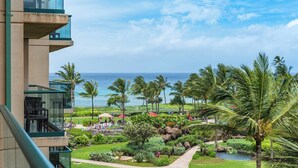 A resort with a view of the ocean, palm trees, and a pool area. - Honua Kai | Ocean View 4 BR, Sleeps 12 | Car Incl. w/ 6+ Nights | HKH ML-1793 by KBM (Lahaina)