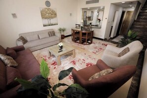 Living area - Pool view Duplex Near Auc (New Cairo City)