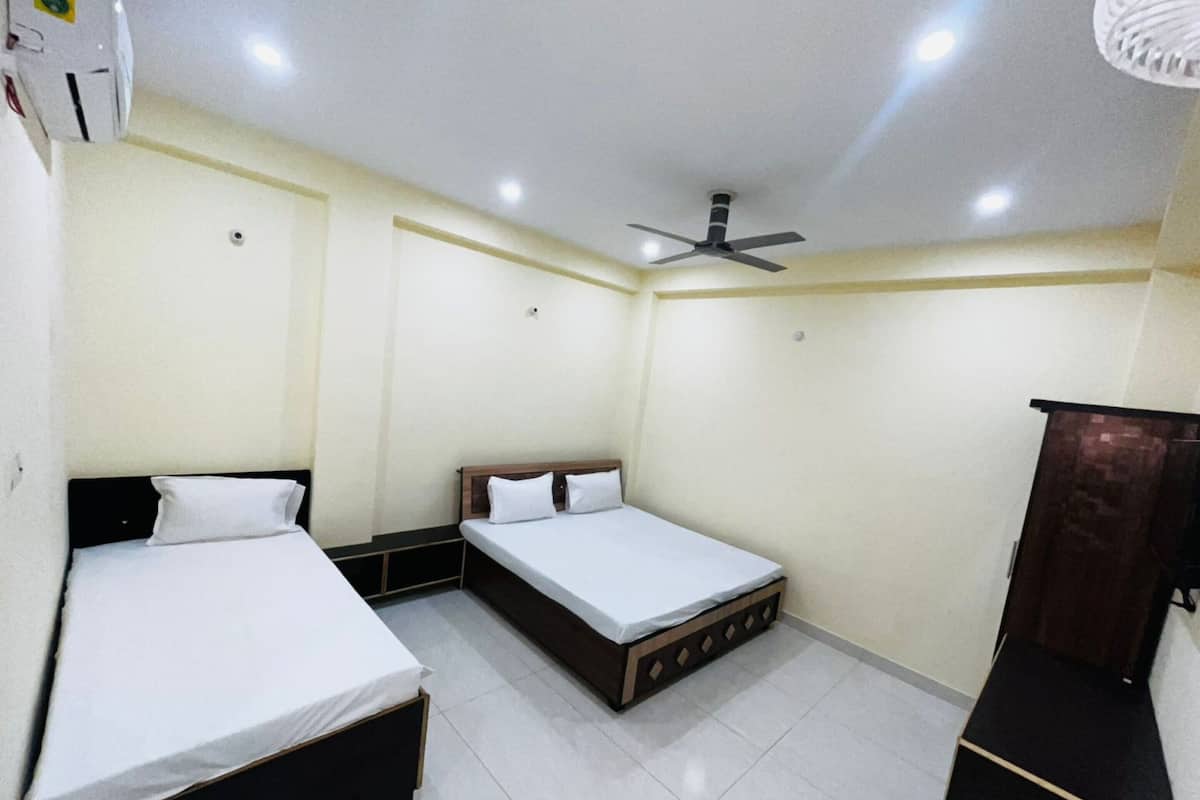 Habitación triple Deluxe, vistas a la ciudad | Wifi gratis