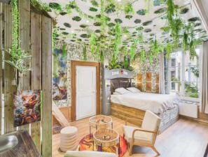 Chambre Deluxe, vue ville | Coin séjour