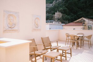 Superior Quadruple Room, City View | Terrace/patio