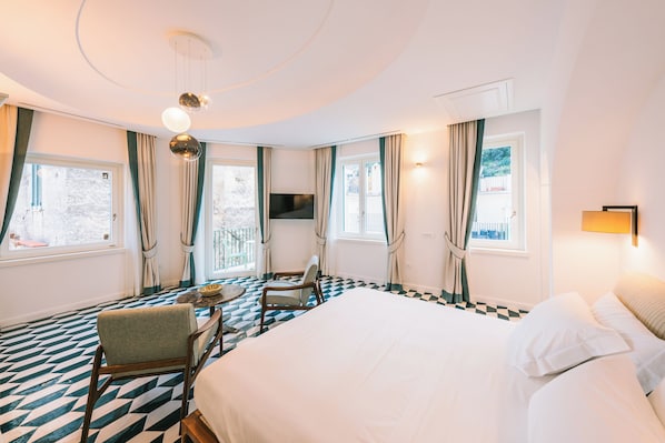 Deluxe Room, Balcony, City View | In-room safe, blackout drapes, iron/ironing board, free WiFi