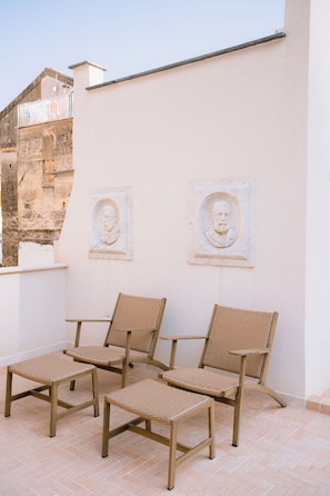 Superior Quadruple Room, City View | Terrace/patio