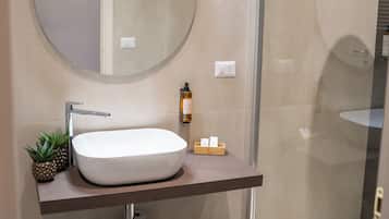 Deluxe Triple Room, Balcony, City View | Bathroom | Shower, free toiletries, hair dryer, slippers