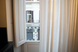 Deluxe Triple Room, Balcony, City View | Blackout drapes, iron/ironing board, free WiFi